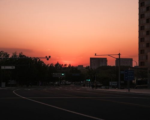 Evening city streets and sunset